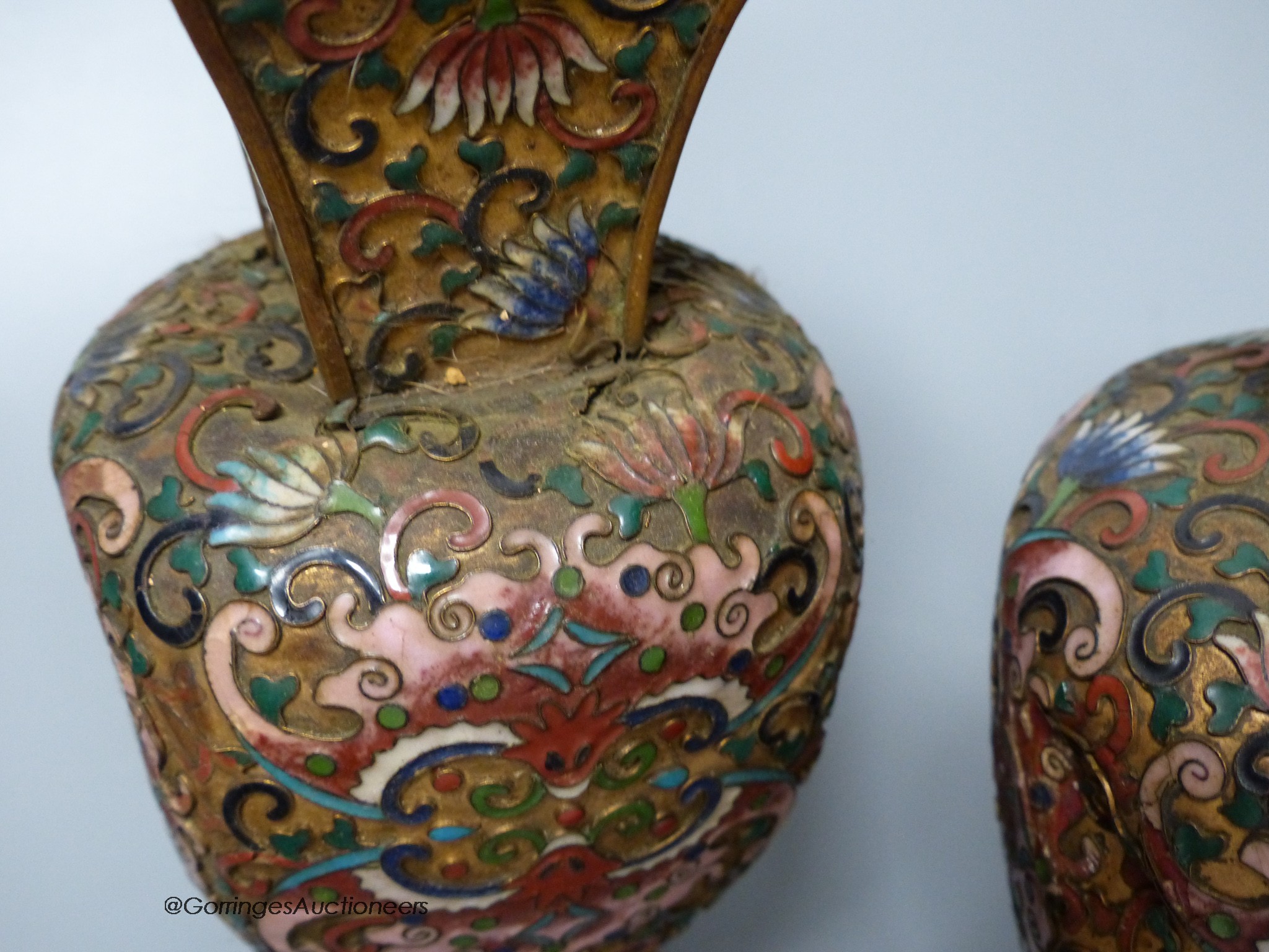 A pair of Chinese gilt ground cloisonné enamel vases, 16cm high a similar jar and cover